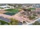 This aerial shot showcases a large community garden with private plots and an open workspace at 2646 E Megan St, Gilbert, AZ 85295