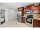 Bright kitchen with stainless steel appliances and wooden cabinets at 2646 E Megan St, Gilbert, AZ 85295