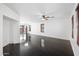 Spacious living room featuring hard wood floors and a ceiling fan at 2646 E Megan St, Gilbert, AZ 85295