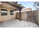 Covered patio with a partial pergola and gate access to the backyard at 2646 E Megan St, Gilbert, AZ 85295