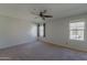 Bright bedroom with ceiling fan and carpet at 2960 E Darrow St, Phoenix, AZ 85042