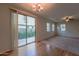 Dining area with hardwood floor, sliding glass doors to patio at 2960 E Darrow St, Phoenix, AZ 85042