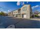 Tan stucco 2-story townhome with attached garage and balcony at 2960 E Darrow St, Phoenix, AZ 85042