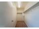 Large walk-in closet with shelving and carpet at 2960 E Darrow St, Phoenix, AZ 85042