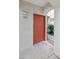 Inviting entryway with a red door and landscaping at 2992 N Miller Rd # 210A, Scottsdale, AZ 85251