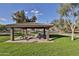 Open picnic area with many tables offers a comfortable place to relax and take break under shade at 30968 W Monterey Ave, Buckeye, AZ 85396