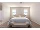 Bright bedroom with king bed and ensuite bath at 31045 W Cheery Lynn Rd, Buckeye, AZ 85396