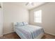 Bedroom with full-size bed and window at 31045 W Cheery Lynn Rd, Buckeye, AZ 85396