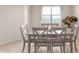 Bright dining room with table and six chairs at 31045 W Cheery Lynn Rd, Buckeye, AZ 85396