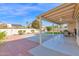 An expansive patio, complemented by lush landscaping, creates a serene outdoor retreat at 3352 E Hopi Ave, Mesa, AZ 85204