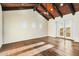 Bright bedroom with hardwood floors, vaulted ceiling and French doors at 36430 N 34Th Ave, Phoenix, AZ 85086