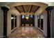 Bright dining room with tiled floors, arched doorways, and a chandelier at 36430 N 34Th Ave, Phoenix, AZ 85086