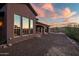 Home exterior showcasing large windows and sunset views at 36430 N 34Th Ave, Phoenix, AZ 85086