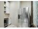 Stainless steel refrigerator and wine cooler in kitchen at 36430 N 34Th Ave, Phoenix, AZ 85086