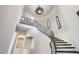 Stunning curved staircase with wrought iron railing at 36430 N 34Th Ave, Phoenix, AZ 85086