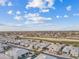 Bird's-eye view of the community showcasing homes and golf course at 3990 E Alameda Ln, Gilbert, AZ 85298