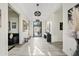 Bright and airy foyer with high ceilings and modern light fixtures at 3990 E Alameda Ln, Gilbert, AZ 85298