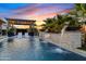 Luxury pool and patio area with pergola and waterfall feature at 3990 E Alameda Ln, Gilbert, AZ 85298