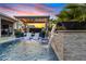 Resort-style pool with a water feature and pergola at 3990 E Alameda Ln, Gilbert, AZ 85298