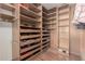 Spacious closet featuring multiple shelves and drawers at 4248 E Raven Rd, Phoenix, AZ 85044