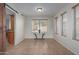 Bright dining room with tile floors and large windows at 4248 E Raven Rd, Phoenix, AZ 85044