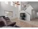 Spacious living room with high ceilings, a loft, and tiled floors at 4248 E Raven Rd, Phoenix, AZ 85044