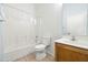 Bathroom featuring a shower-tub combo, toilet, and vanity at 505 W Wayland Dr, Phoenix, AZ 85041