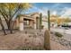 Inviting single-story home with desert landscaping, cacti, and a cozy front porch at 505 W Wayland Dr, Phoenix, AZ 85041