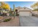 Charming single-story home featuring desert landscaping, mature cacti, and a two-car garage at 505 W Wayland Dr, Phoenix, AZ 85041