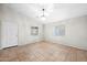 Inviting living room with a chandelier and natural light streaming through windows at 505 W Wayland Dr, Phoenix, AZ 85041