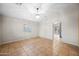 Living room with light walls and tile flooring, perfect for entertaining at 505 W Wayland Dr, Phoenix, AZ 85041