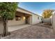 Covered patio featuring stained concrete and brick pavers at 505 W Wayland Dr, Phoenix, AZ 85041