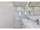 Modern bathroom with double vanity, marble countertops, and glass shower at 523 S Spencer St, Mesa, AZ 85204