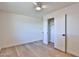 Bedroom with light flooring, ceiling fan, and closet at 523 S Spencer St, Mesa, AZ 85204