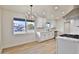 Modern kitchen with white shaker cabinets and quartz countertops at 523 S Spencer St, Mesa, AZ 85204