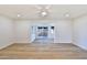 Open living space featuring hardwood floors and sliding glass doors at 523 S Spencer St, Mesa, AZ 85204