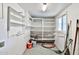 Clean and spacious storage room with ample shelving at 523 S Spencer St, Mesa, AZ 85204