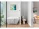 Elegant bathroom featuring a freestanding tub and shower at 533 W Oregon Ave, Phoenix, AZ 85013