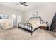 Spacious bedroom with a comfortable bed and seating area at 533 W Oregon Ave, Phoenix, AZ 85013