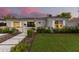 Modern house exterior with landscaped front yard at 533 W Oregon Ave, Phoenix, AZ 85013