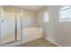 Bathroom with shower and bathtub at 5427 W St Kateri Dr, Laveen, AZ 85339