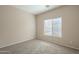 Spacious bedroom with neutral walls and carpet at 5427 W St Kateri Dr, Laveen, AZ 85339