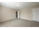 Bedroom with carpet and door to hallway at 5427 W St Kateri Dr, Laveen, AZ 85339