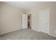 Bedroom with access to bathroom and additional closet at 5427 W St Kateri Dr, Laveen, AZ 85339