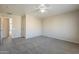 Bedroom with ceiling fan and access to bath at 5427 W St Kateri Dr, Laveen, AZ 85339