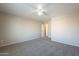 Bedroom with ceiling fan and doorway at 5427 W St Kateri Dr, Laveen, AZ 85339