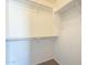 Roomy closet with double hanging rods and shelving at 5427 W St Kateri Dr, Laveen, AZ 85339