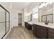 Elegant Primary bathroom with double vanity and large shower at 5509 N 193Rd Ave, Litchfield Park, AZ 85340