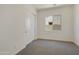 Bedroom with carpet, sliding door and window at 5509 N 193Rd Ave, Litchfield Park, AZ 85340