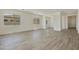 Spacious living room featuring wood-look tile floors at 5509 N 193Rd Ave, Litchfield Park, AZ 85340